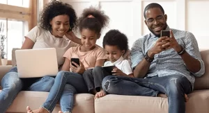 family-using-devices-COMPRESSED